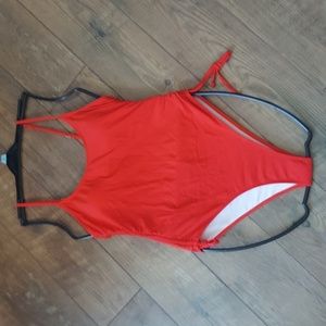 Cute new without tags size large red one piece with adjustable straps
